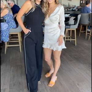 Lulus halter black/white romper. Size 4! Wore 1x for a wedding! Thick/flattering